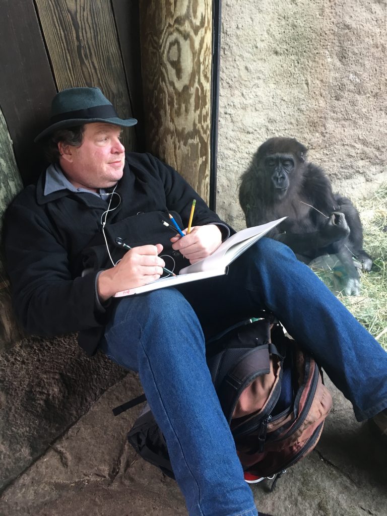 wpmorse: I draw gorillas as my model, Yola, watches at the Woodland Park Zoo.